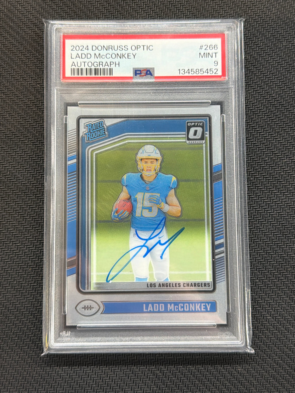 2024 Donruss Optic Ladd McConkey Rookie Auto /325 PSA 9 452
