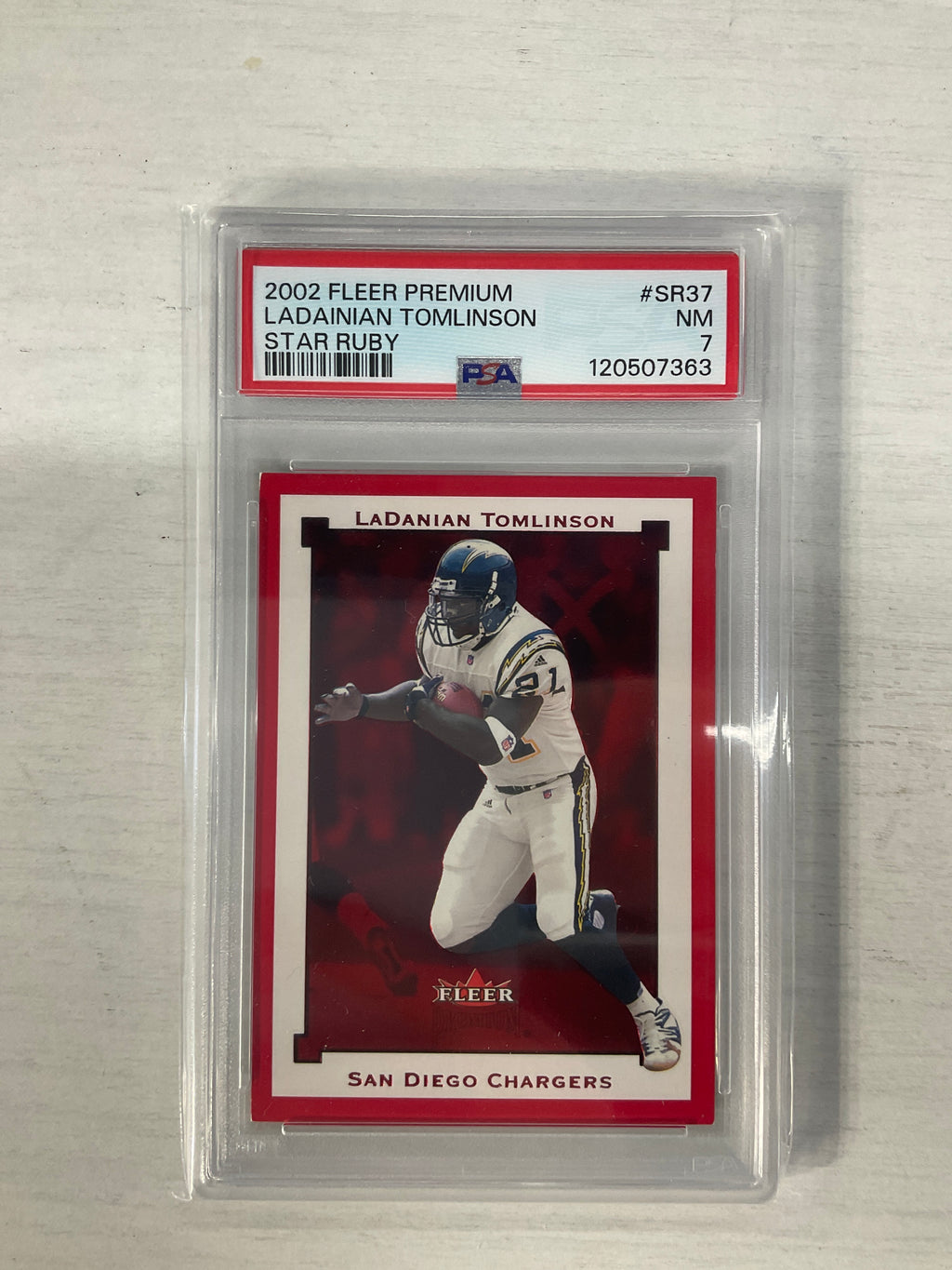 2002 Fleer Premium Ladainian Tomlinson Star Ruby /100 PSA 7