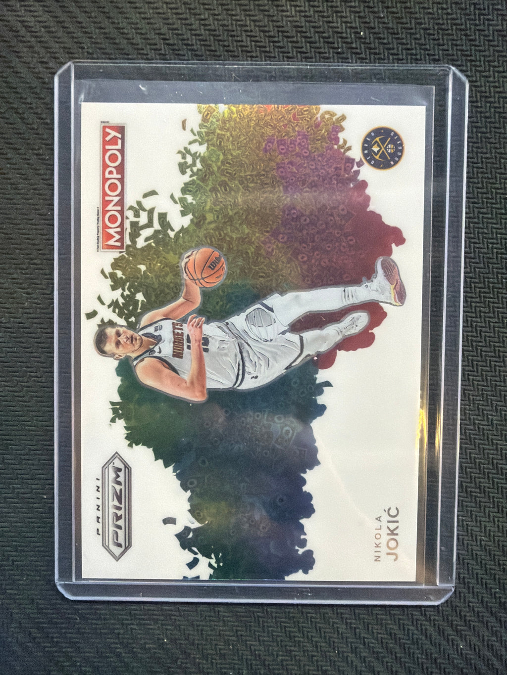 2023-24 Panini Prizm Nikola Jokic Monopoly Color Blast #MB-1 Nuggets