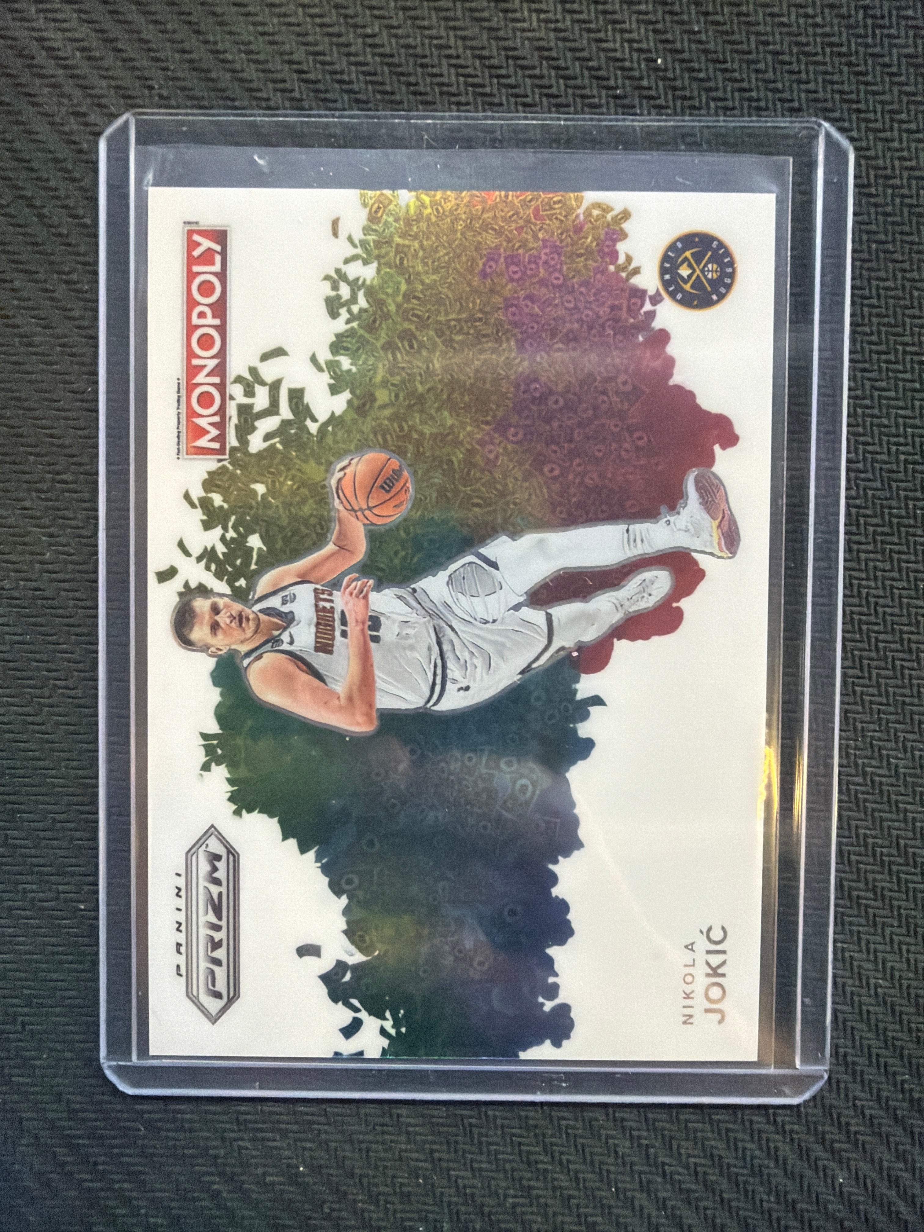2023-24 Panini Prizm Nikola Jokic Monopoly Color Blast #MB-1 Nuggets