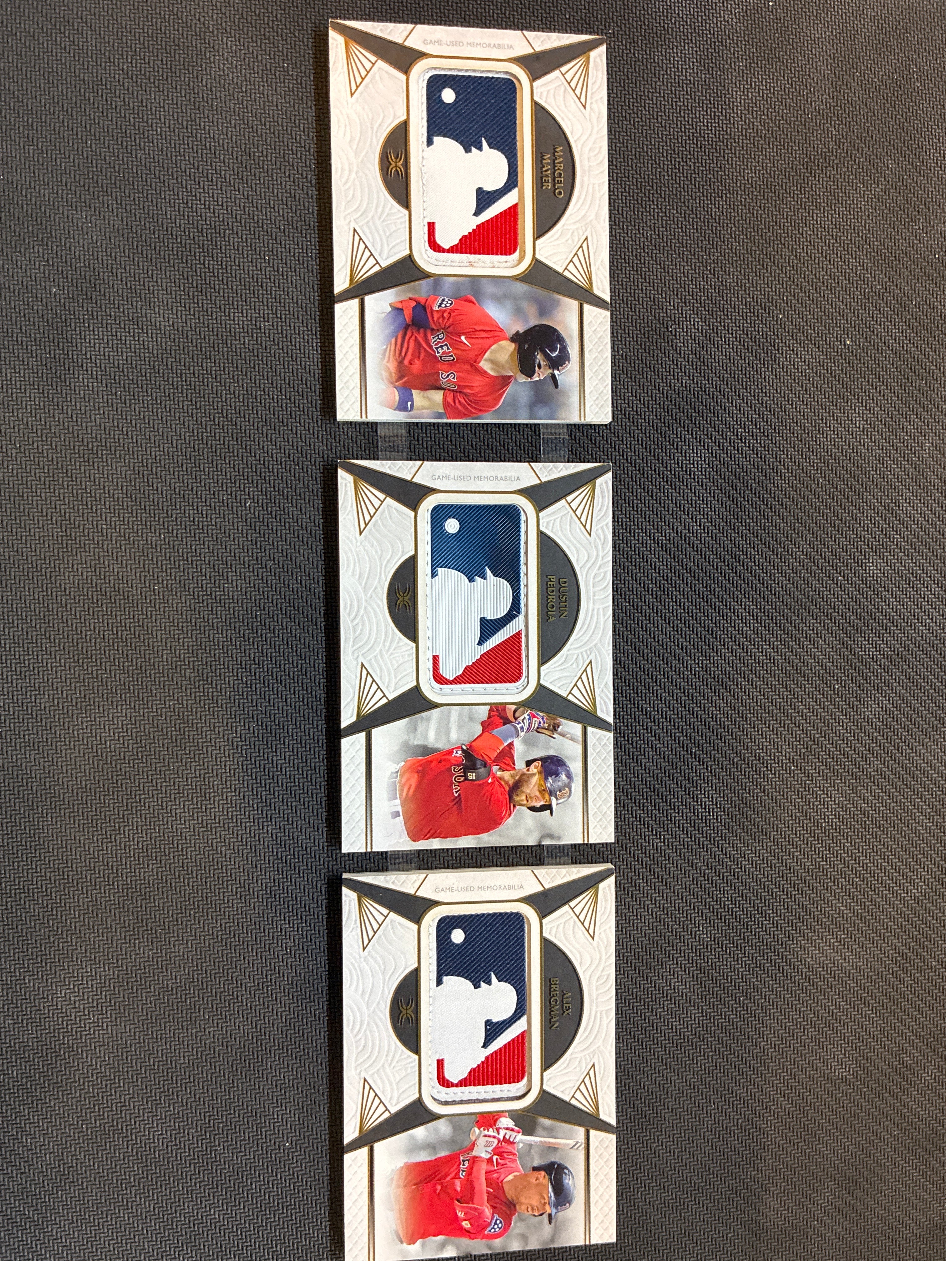 2025 Topps Definitive Triple MLB Logo Patch Book 1/1 Marcelo Mayer / Dustin Pedroia / Alex Bregman Red Sox