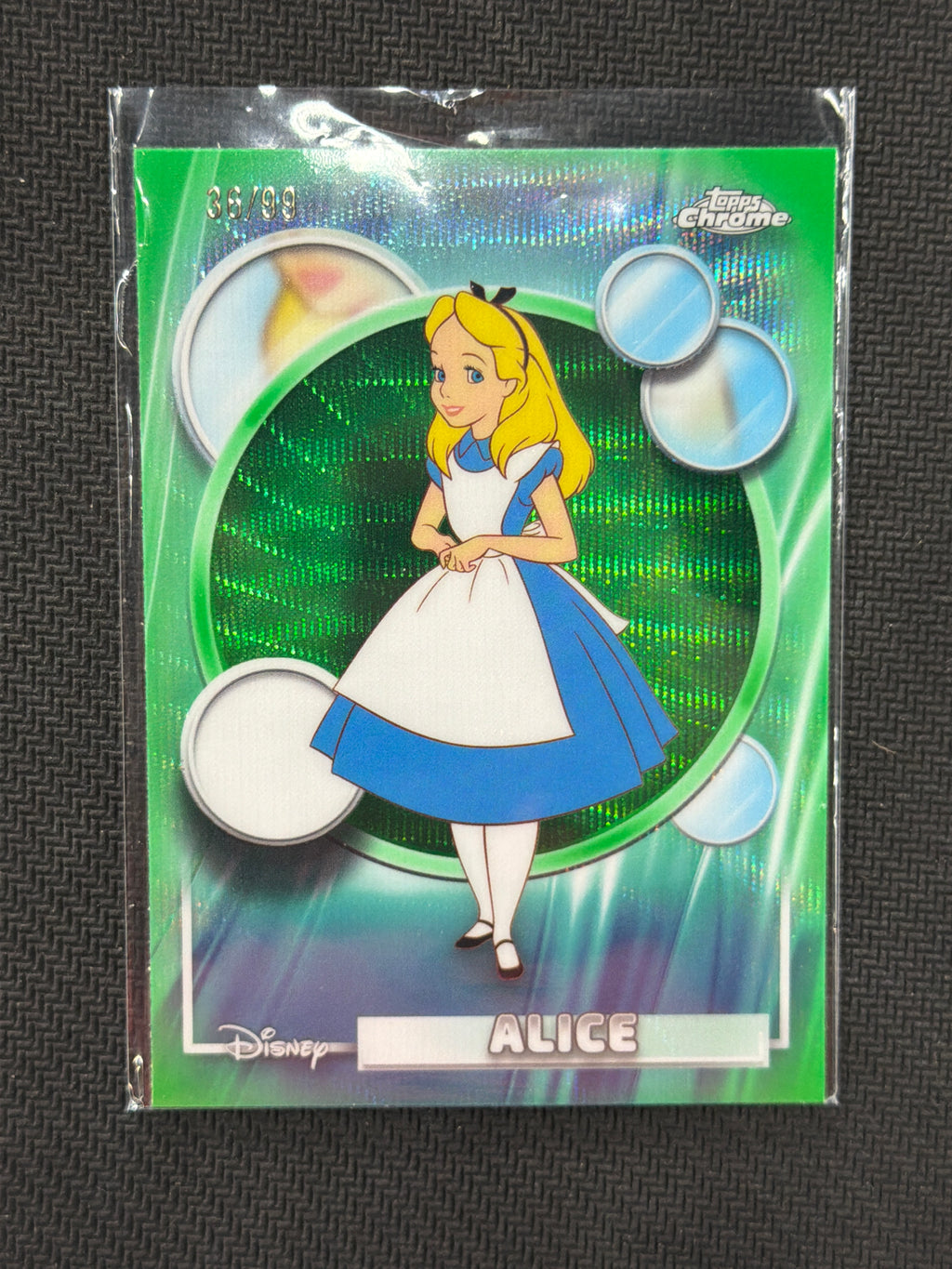 2026 Topps Chrome Disney Alice Green Wave /99