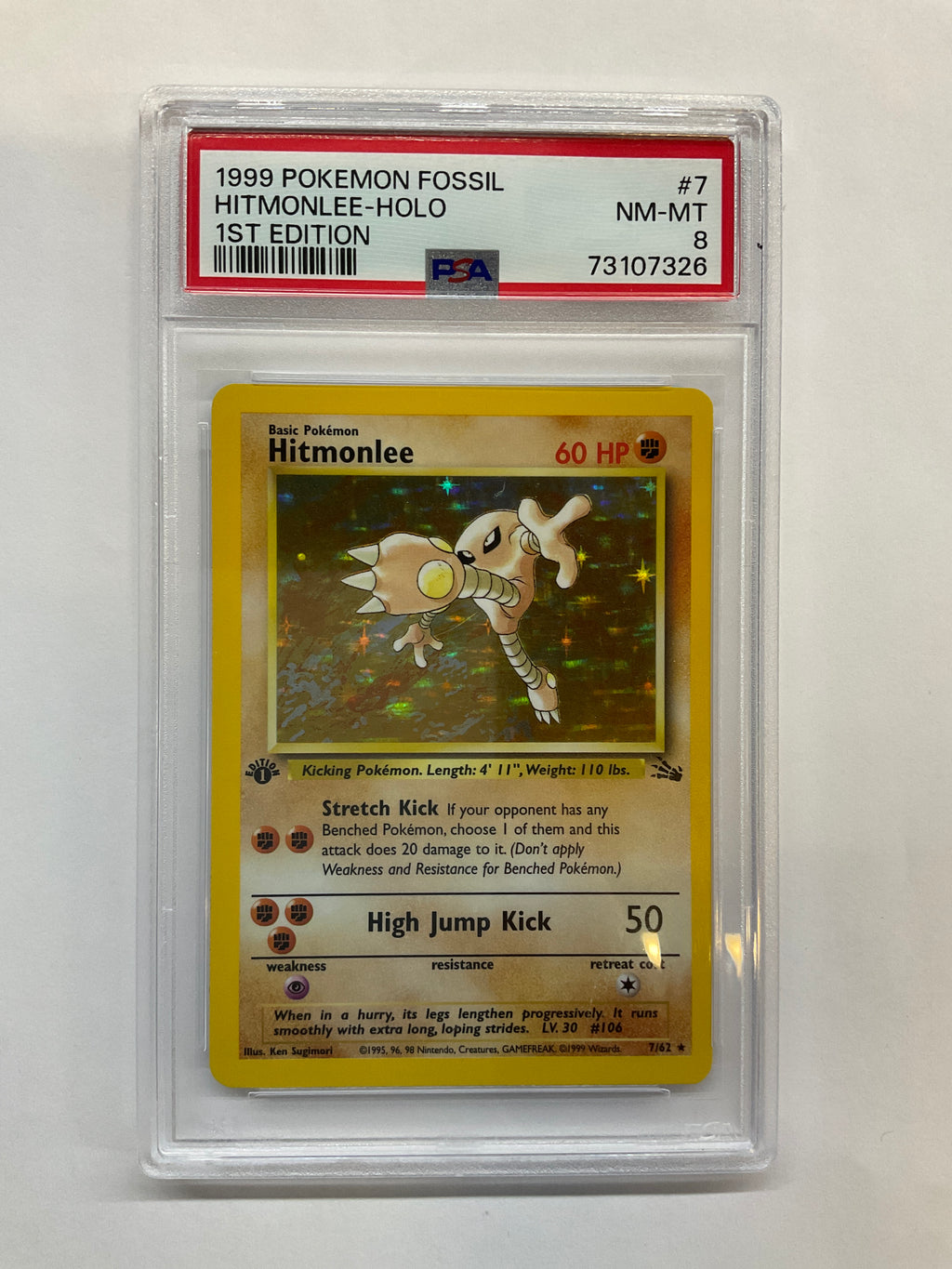1999 Pokemon Fossil Hitmonlee Holo 7 1st Ed PSA 8