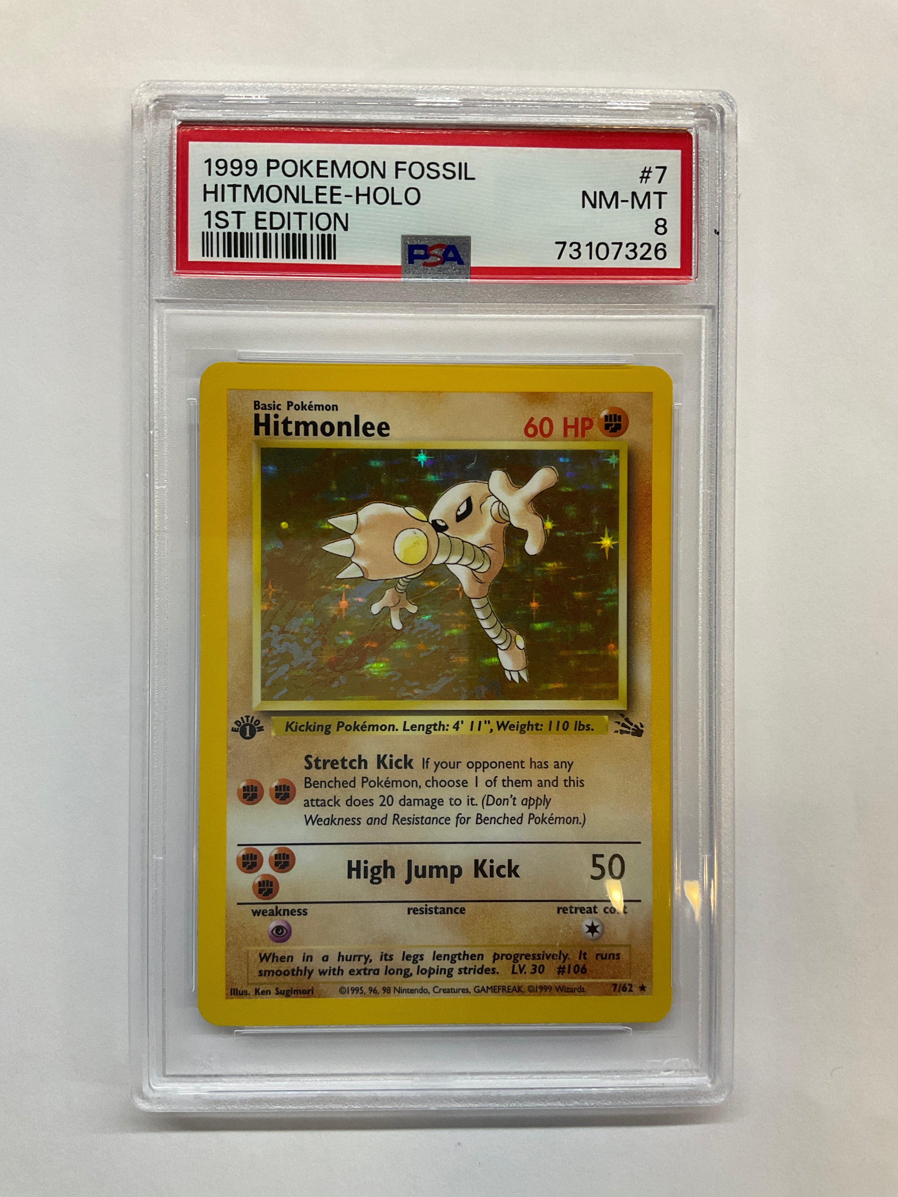 1999 Pokemon Fossil Hitmonlee Holo 7 1st Ed PSA 8