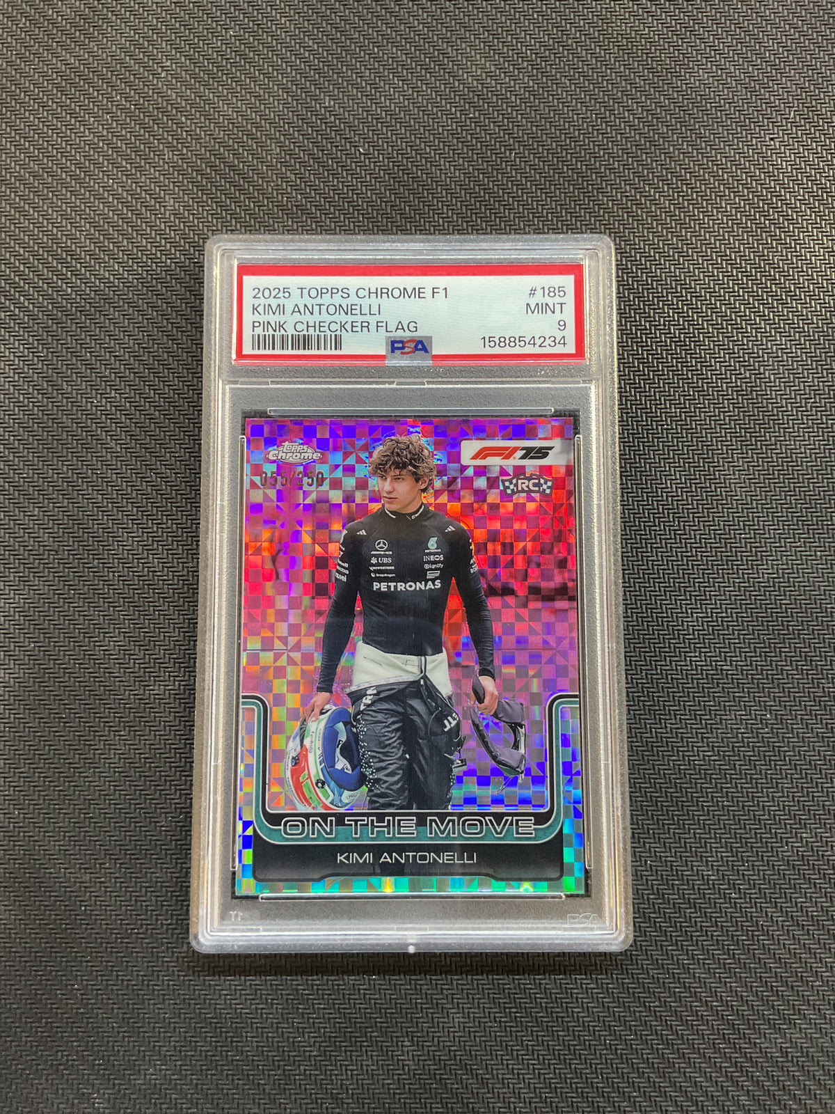 2025 Topps Chrome F1 Kimi Antonelli On the Move Pink Checker Flagg Rookie /250 PSA 9