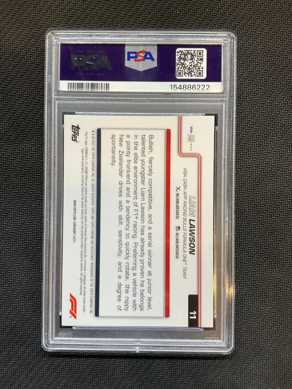 2025 Topps Chrome F1 Liam Lawson Checker Flag PSA 7