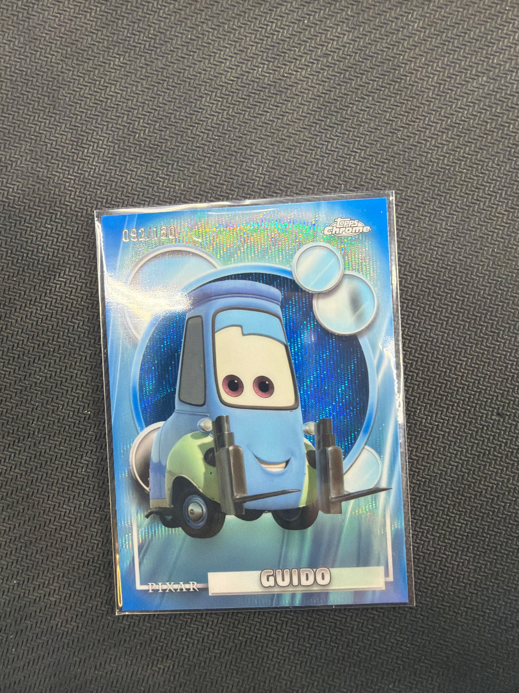 2026 Topps Chrome Disney Guido Blue Wave /150 Cars