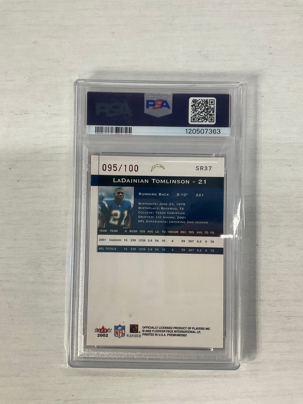 2002 Fleer Premium Ladainian Tomlinson Star Ruby /100 PSA 7