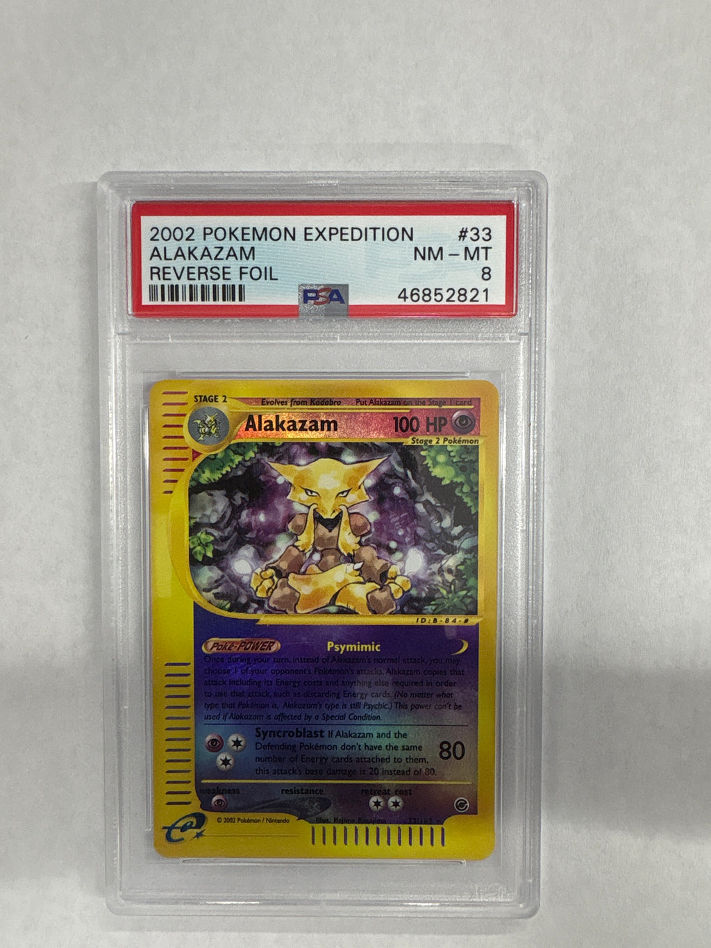 2002 Pokemon Expedition Alakazam Reverse Holo 33 PSA 8