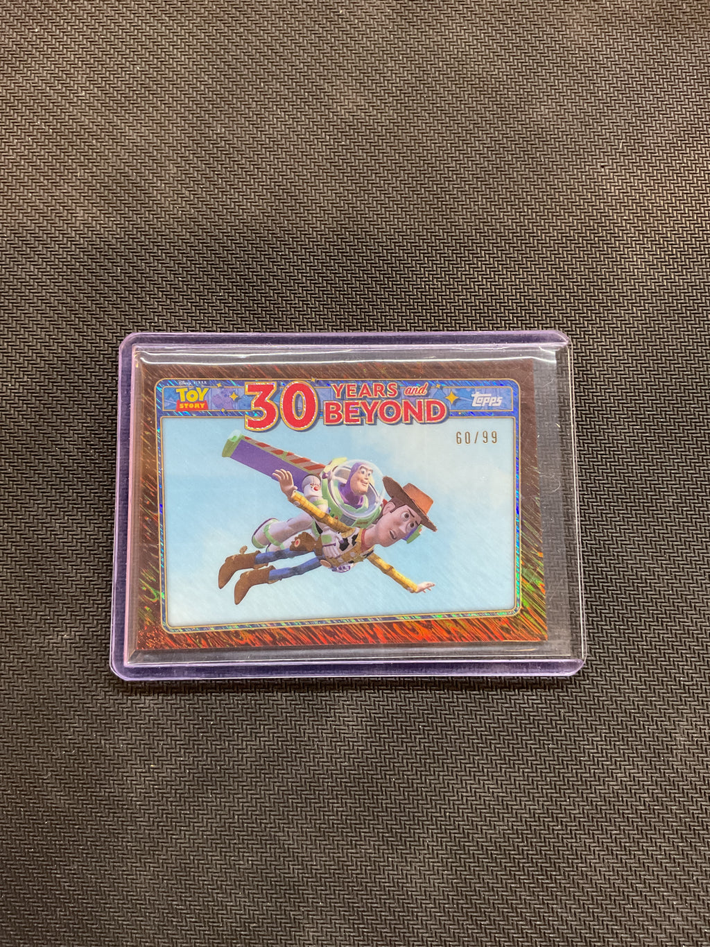 2025 Topps Toy Story Woody / Buzz Lightyear Falling With Style Bronze Shimmer /99
