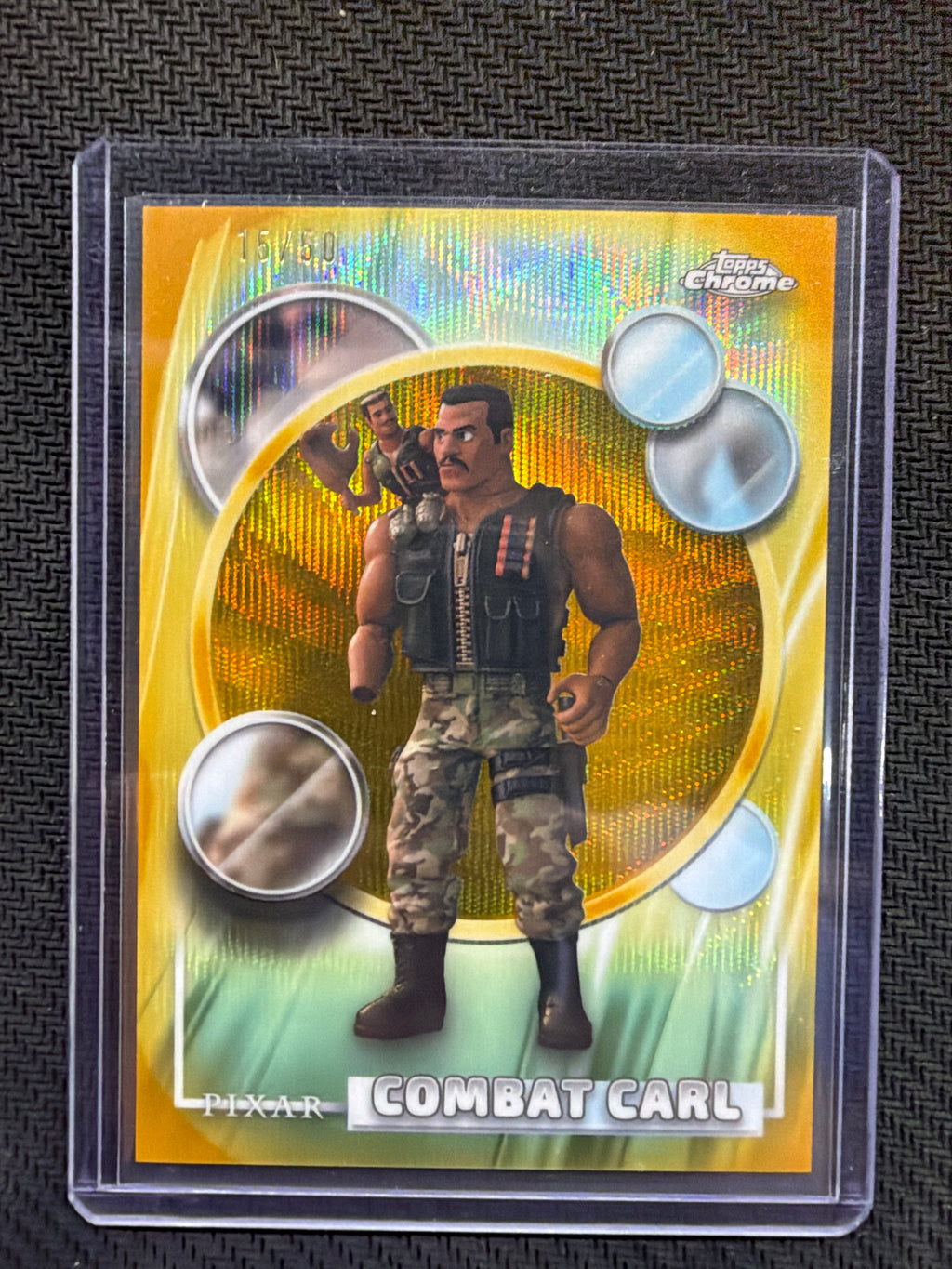 2026 Topps Chrome Disney Combat Carl Gold Wave /50 Toy Story