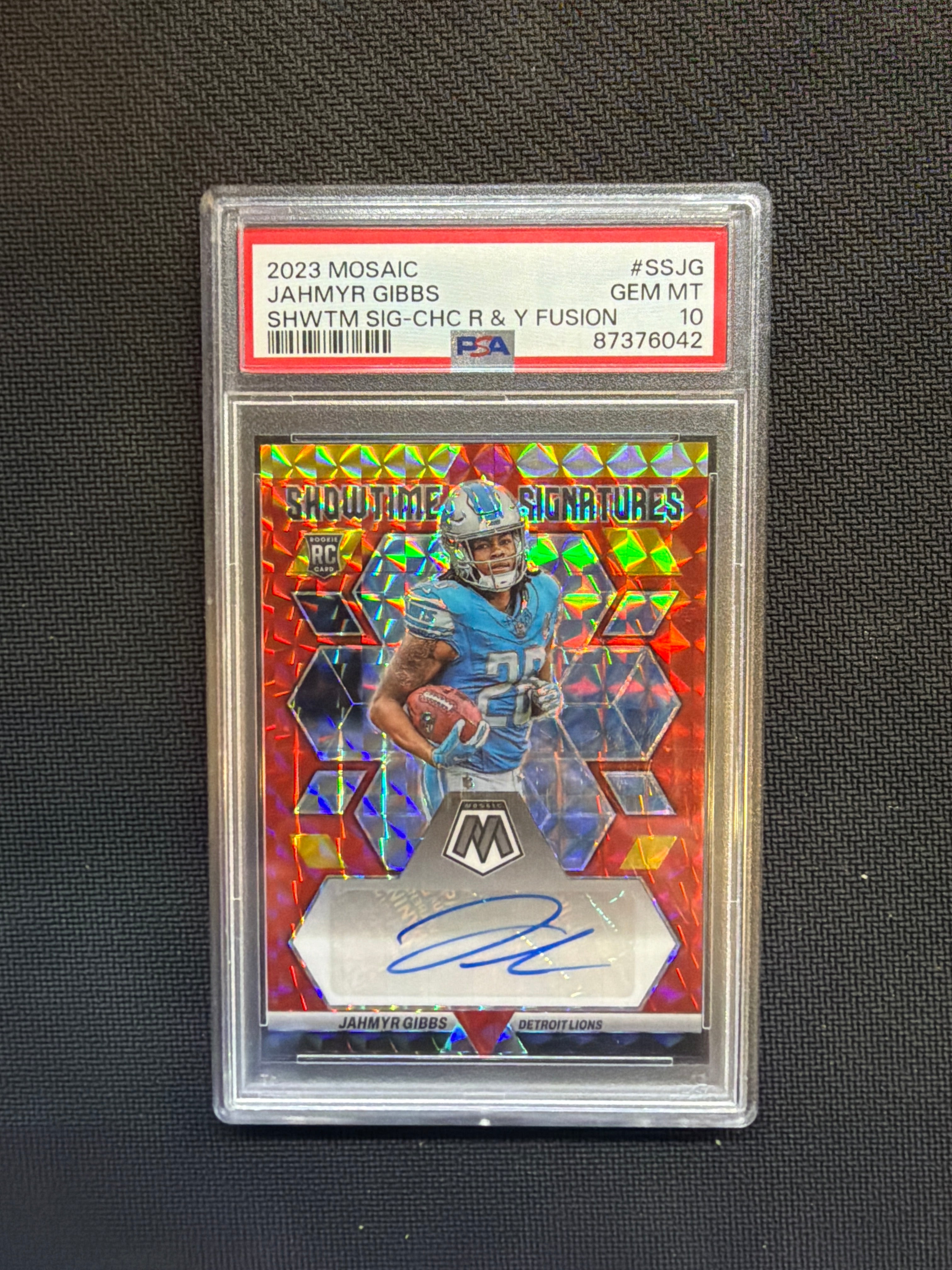 2023 Mosaic Jahmyr Gibbs Rookie Auto Red Yellow Choice PSA 10