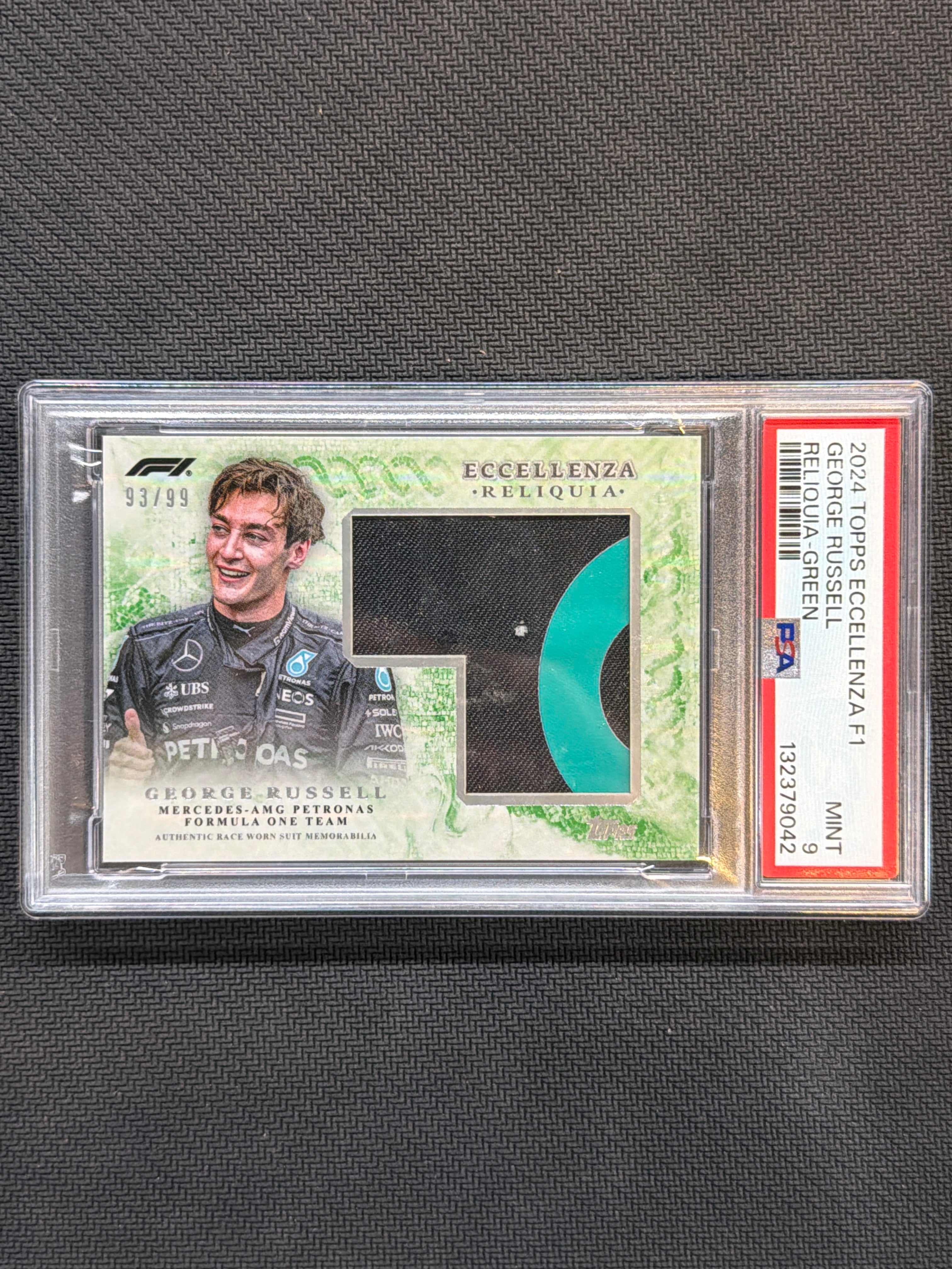 2024 Topps Eccellenza F1 George Russell Reliquia Green Patch /99 PSA 9