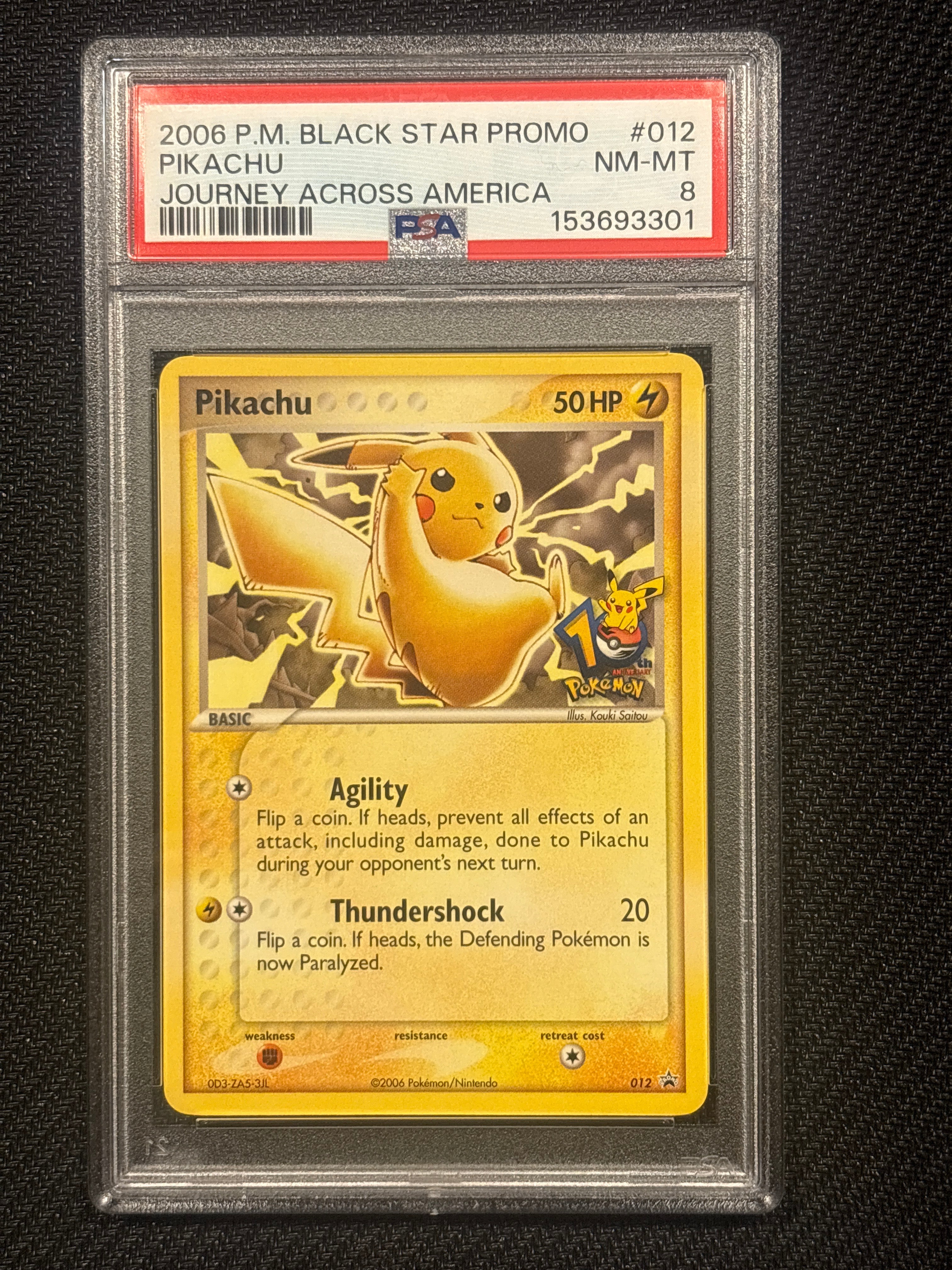 2006 Pokemon Journey Across America Promo Pikachu 012 PSA 8